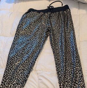 HEIMISH USA Black and Gold Leopard Print Joggers